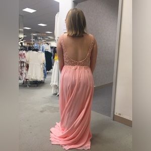Peach prom dress with low back and slit